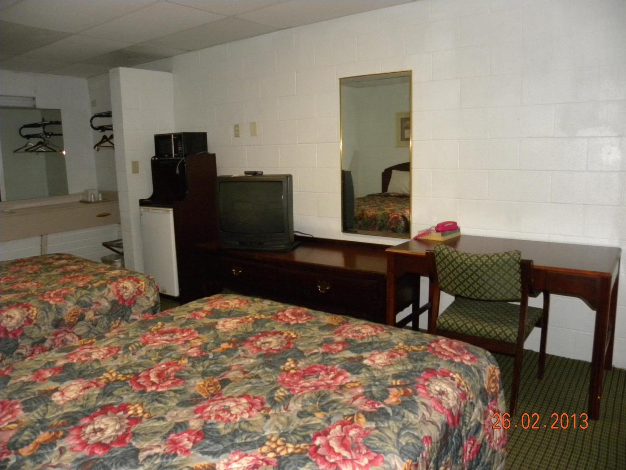 Guest Inn Rogers Bagian luar foto