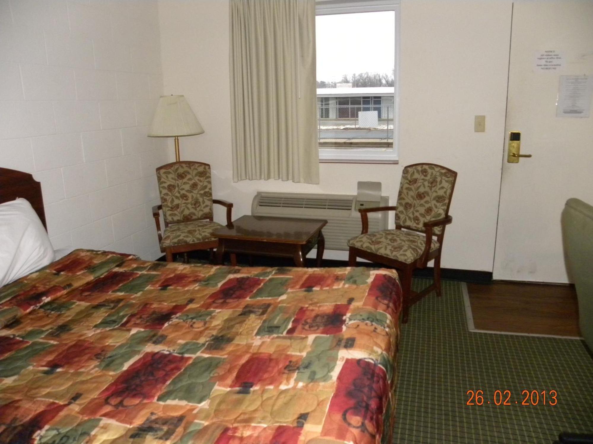 Guest Inn Rogers Bagian luar foto