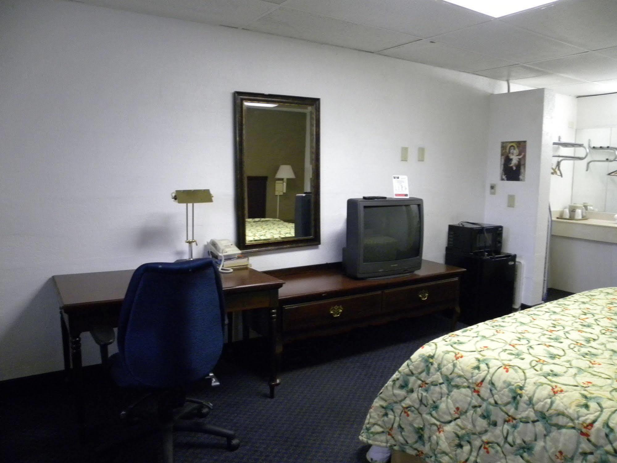 Guest Inn Rogers Bagian luar foto