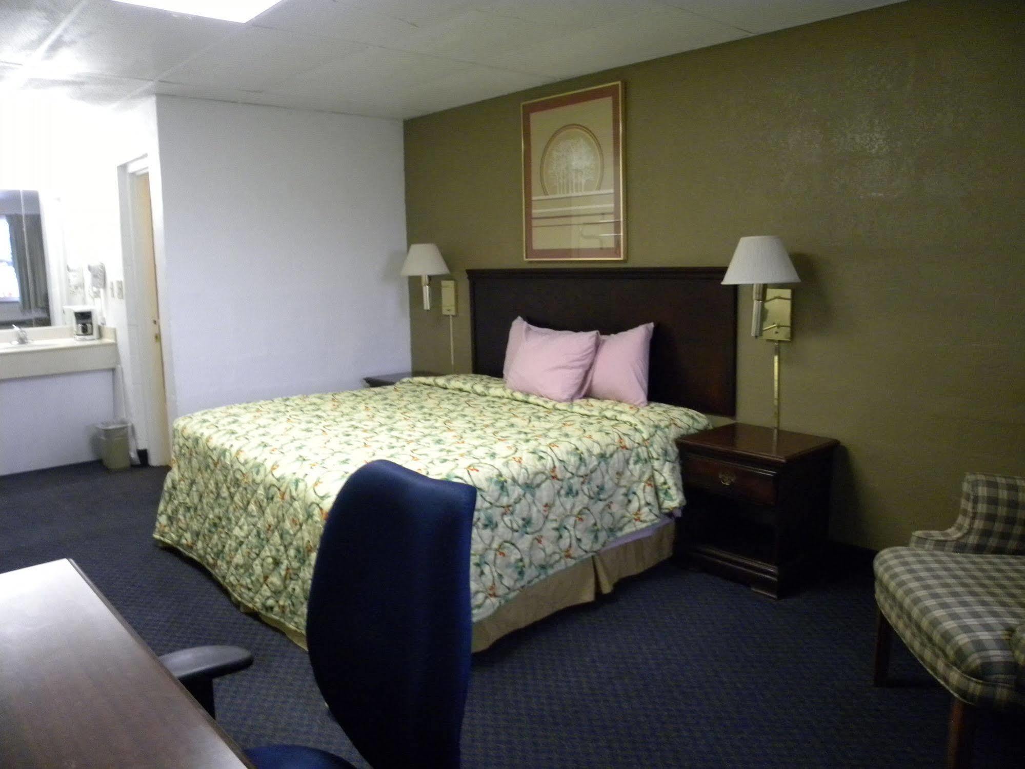 Guest Inn Rogers Bagian luar foto