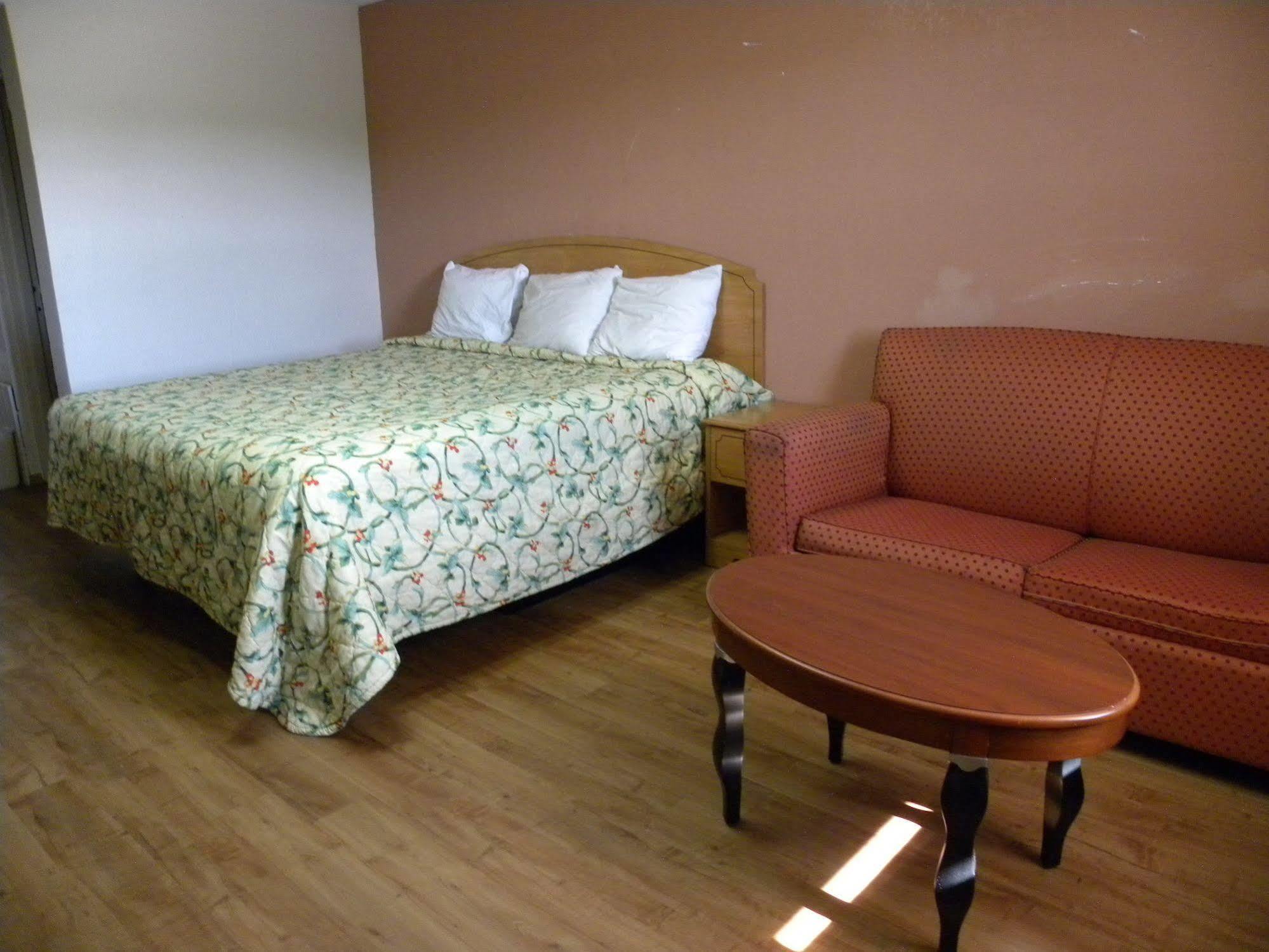 Guest Inn Rogers Bagian luar foto