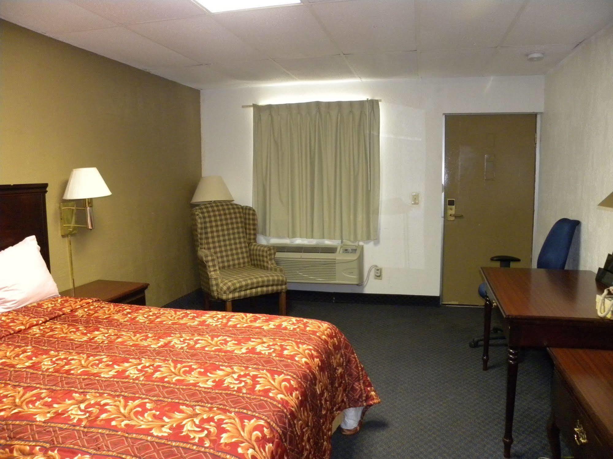 Guest Inn Rogers Bagian luar foto