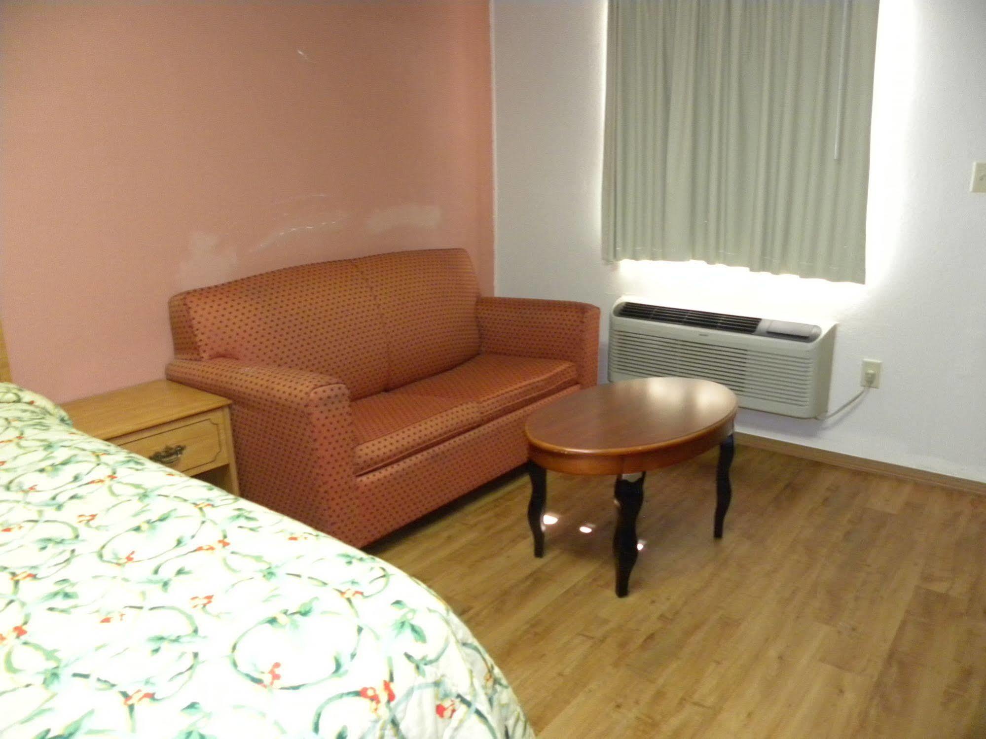Guest Inn Rogers Bagian luar foto