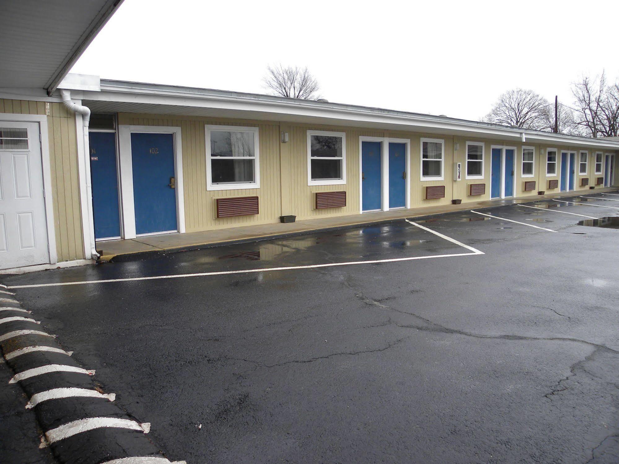 Guest Inn Rogers Bagian luar foto